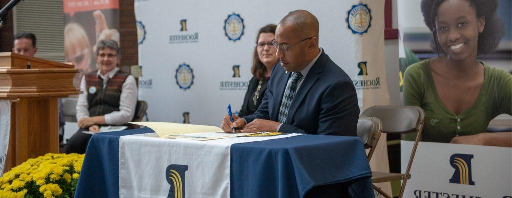 President Boyd Signs Compassion Charter